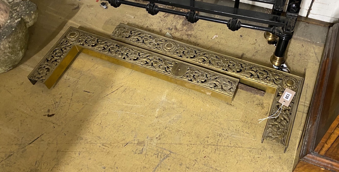 A brass two section fire kerb, width 154cm